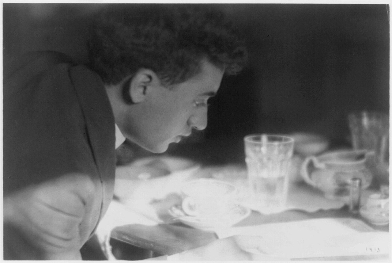 A newspaper and coffee on a table